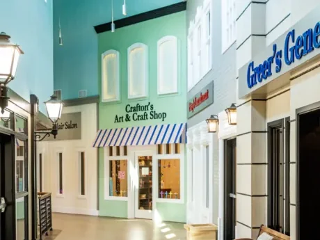 Crafton's Art & Craft Shop at the end of the indoor Main Street in memory care.