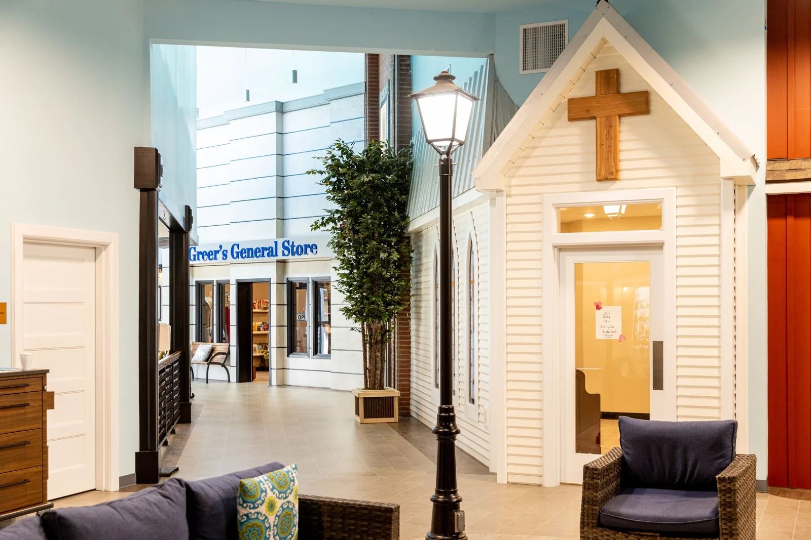 The chapel, a lamp post and Greer's General Store on the indoor Main Street in memory care.